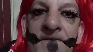 bisexual crossdressing gay mark wright has painted cocks on his face while he licks his cum clean of his hand and shows you it in his mouth afterwards